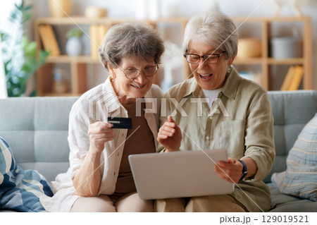 Women are doing online purchases Women are doing online purchases 129019521