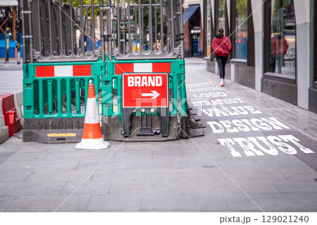 Brand Strategy and Identity Concept Illustrated with Urban Signage and Marketing Keywords on 129021240