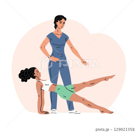 Young woman exercises under supervision of physiotherapist 129021358