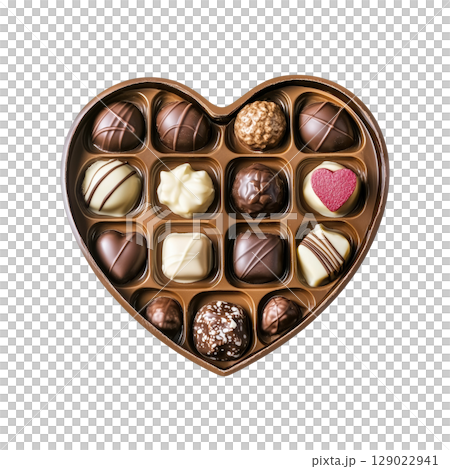Heart-Shaped Box Of Assorted Chocolates. Gourmet Gift For Special Occasions And Celebrations Isolated On Transparent Background Heart-Shaped Box Of Assorted Chocolates. Gourmet Gift For Special Occasions And Celebrations Isolated On Transparent Background 129022941