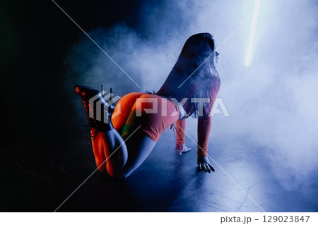 Gorgeous Woman Dancing Sexy Movements, Body, Hair.pro Erotic Hot Dancer On Heels 129023847