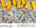 Paper us 100 dollar bill with gold bars, concept of investment and saving, wealth 129025121