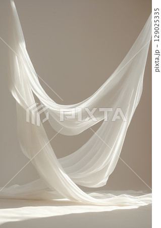 flowing light white fabric. Light room with shine through the window flowing light white fabric. Light room with shine through the window 129025335