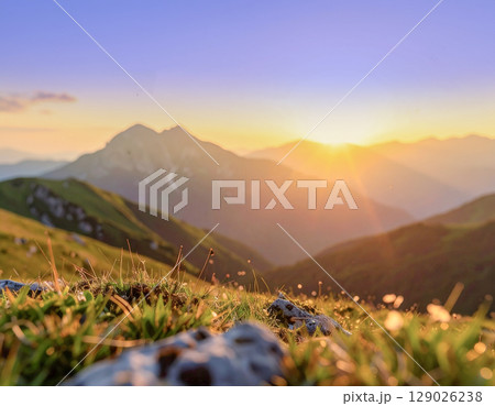 AI生成画像 秋の夕焼けに染まる野山の風景 129026238