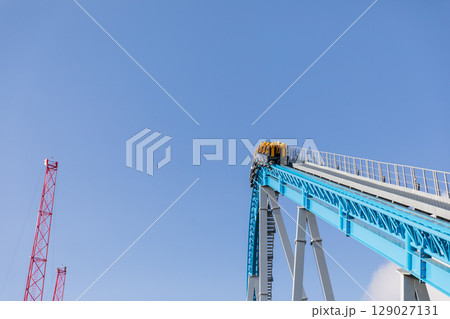 Roller coaster rails on attraction in a children's park Roller coaster rails on attraction in a children's park 129027131