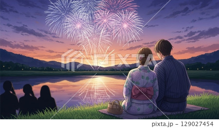 夕暮れ河畔で花火を見上げる浴衣カップル 夕暮れ河畔で花火を見上げる浴衣カップル 129027454