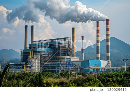 Coal fired power station releasing smoke into the atmosphere is polluting the environment 129029413