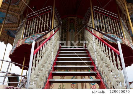 Captivating Carousel Stairs: A Closer Look at the Enchanting Details of a Vintage Amusement Ride Captivating Carousel Stairs: A Closer Look at the Enchanting Details of a Vintage Amusement Ride 129030070