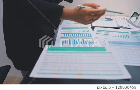 Success, audience with an applause and in a business meeting at work with a lens flare together. Achievement or celebration, motivation and businesspeople clapping hands for good news or support 129030459