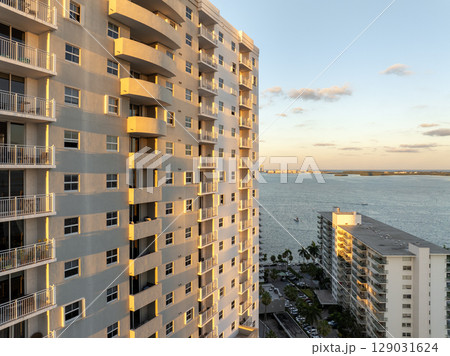 Urban landscape of downtown district of Miami Brickell in Florida, USA. Evening skyline with high skyscraper buildings in modern American coastal city 129031624