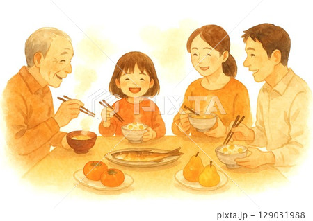 秋の食卓を囲む家族の団らん(栗ごはんと秋の味覚) 秋の食卓を囲む家族の団らん(栗ごはんと秋の味覚) 129031988