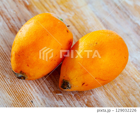 Loquat fruit or chinese plum 129032226