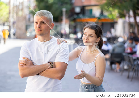 Quarrel between guy and girl during walk Quarrel between guy and girl during walk 129032734