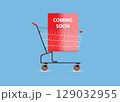 Shopping cart with Coming Soon word on blue background. 129032955