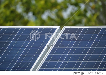 Sustainable electric power plant with solar photovoltaic panels for producing clean electrical energy. Renewable electricity with zero emission concept 129033257