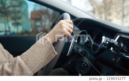 Woman Driving Car, Hands On A Steering Wheel 129033277