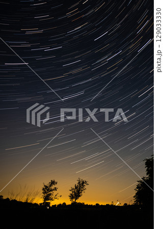 Amazing Night Landscape With Star Trails Amazing Night Landscape With Star Trails 129033330
