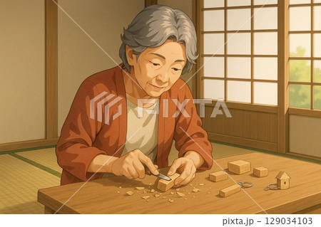 木工細工に集中する高齢女性 129034103