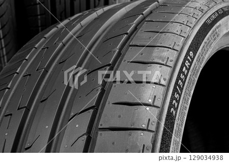 Close-up of 225-35ZR19 Tire Size marking on High Performance Car Summer Tire sidewall 129034938