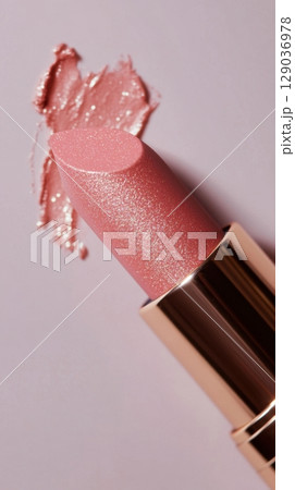 Pink lipstick on a surface 129036978