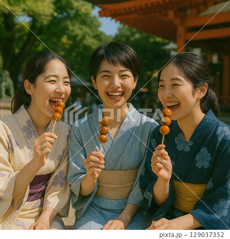 神社境内で団子を食べながら笑っている3人の場面を生成しました 129037352