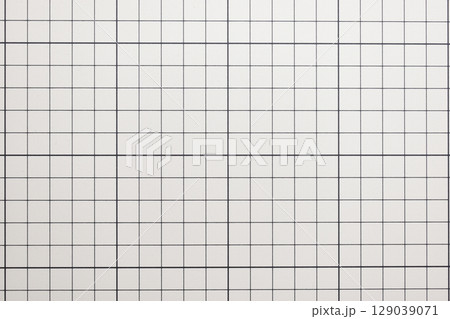 gray cutting mat board background with line and scale measure guide pattern for object art design, tool equipment of diy craft work 129039071