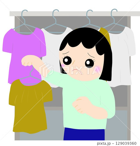 部屋干しの洗濯物に困る女性 部屋干しの洗濯物に困る女性 129039360