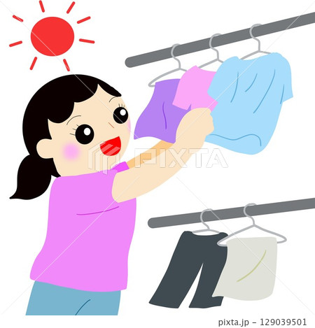 晴れた日に洗濯をする女性 129039501