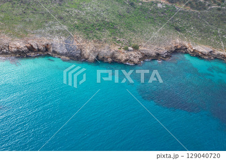Stunning Turquoise Sea in Omprogialos Octopus Bay, Crete 129040720