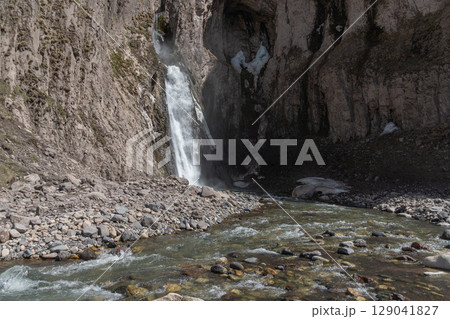 View of Karakaya-Su waterfall cascading down a steep rocky cliff. Ecotourism, outdoor adventure, nature preservation, travel destinations View of Karakaya-Su waterfall cascading down a steep rocky cliff. Ecotourism, outdoor adventure, nature preservation, travel destinations 129041827