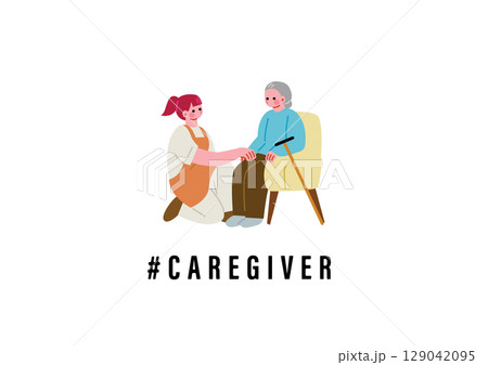 年配女性と会話する介護福祉士の女性 129042095
