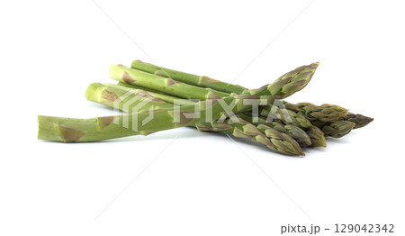 Fresh green asparagus spears, a healthy and delicious vegetable on white. 129042342