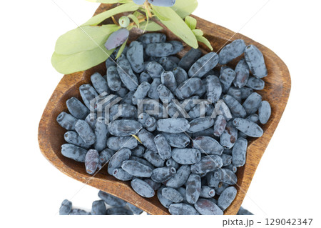 Borealis Honeyberry Haskap berries isolated on white background 129042347