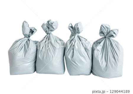 This is a collection of gray trash bags designed for effective waste management 129044189