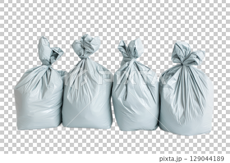 This is a collection of gray trash bags designed for effective waste management 129044189