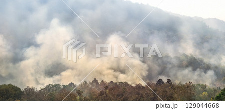 Wildfires release carbon dioxide (CO2) emissions and other greenhouse gases (GHG) that contribute to climate change. 129044668