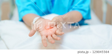 Elderly asian Patient Woman recovery after surgery. Happy Senior illness resting in hospital. Influenza, Fever, treatment, Insurance, Health care and medical, world day of Sick and Health day concept Elderly asian Patient Woman recovery after surgery. Happy Senior illness resting in hospital. Influenza, Fever, treatment, Insurance, Health care and medical, world day of Sick and Health day concept 129045564