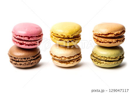 Small colorful tasty sweet original classic macaroons cakes isolated on white studio background 129047117