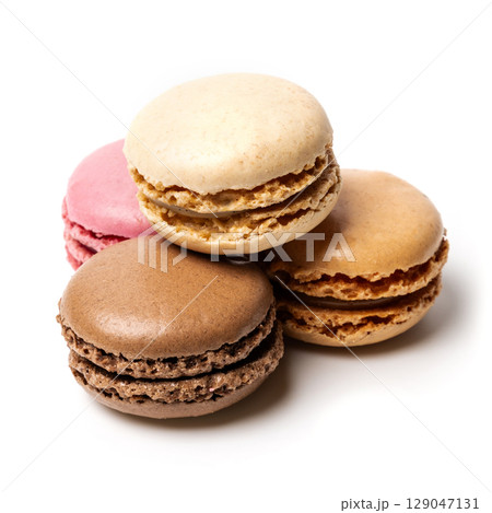Small colorful tasty sweet original classic macaroons cakes isolated on white studio background 129047131