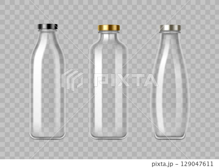 Empty glass milk bottles with metal lids Empty glass milk bottles with metal lids 129047611