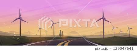 Wind turbines along empty road at sunset Wind turbines along empty road at sunset 129047641