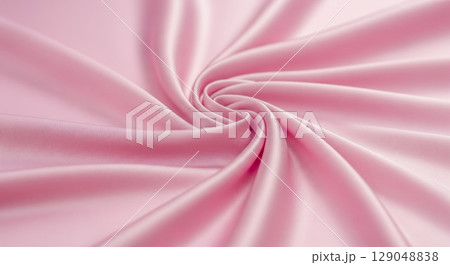 Pink silk fabric texture for elegant background, beautiful soft satin cloth with swirl pattern, luxury textile and fashion concept for wedding design Pink silk fabric texture for elegant background, beautiful soft satin cloth with swirl pattern, luxury textile and fashion concept for wedding design 129048838