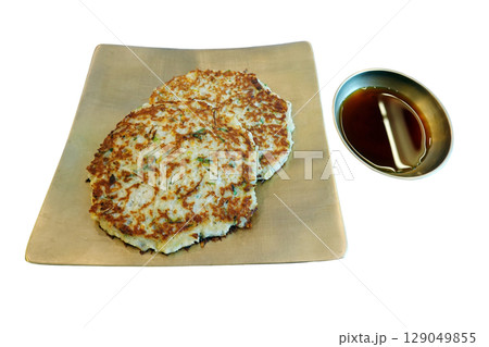 Traditional Korean Mung Bean Pancake Crispy Golden Brown with Soy Sauce isolated on transparent backgroud.  129049855
