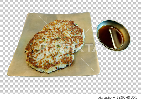 Traditional Korean Mung Bean Pancake Crispy Golden Brown with Soy Sauce isolated on transparent backgroud.  129049855