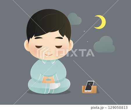 Boy chooses meditation over phone for peaceful, healthy sleep. 129050813