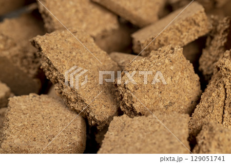 a natural material that is obtained from the bark of a cork tree a natural material that is obtained from the bark of a cork tree 129051741