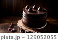 Dark Chocolate Fudge Cake with Raspberries on Wooden Background 129052055