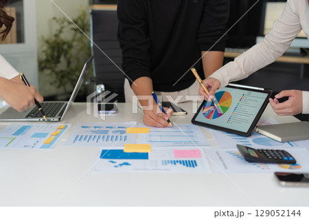 Businessman working and update tasks with milestones progress planning and professional investor working new start up project in the office. Businessman working and update tasks with milestones progress planning and professional investor working new start up project in the office. 129052144