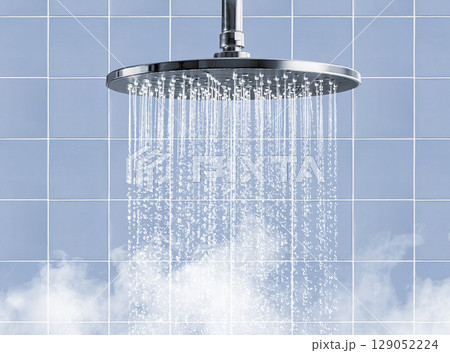 Shower head Providing Water Flow in soft blue bathroom Shower head Providing Water Flow in soft blue bathroom 129052224