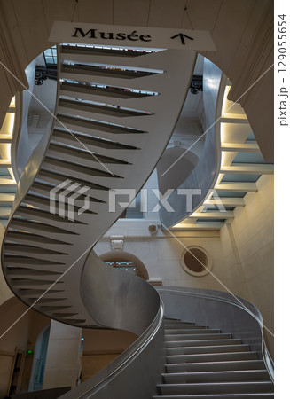 Monumental staircase meanders within National library of france (BnF). Monumental staircase meanders within National library of france (BnF). 129055654